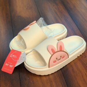 Pink and white bunny slippers